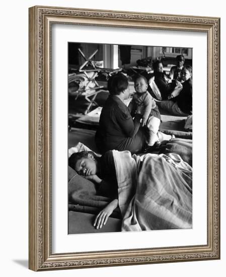 African American Refugees Left Homeless After Severe Flooding Sleep in Temporary Relief Station-Margaret Bourke-White-Framed Photographic Print