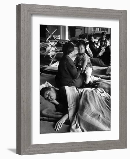 African American Refugees Left Homeless After Severe Flooding Sleep in Temporary Relief Station-Margaret Bourke-White-Framed Photographic Print