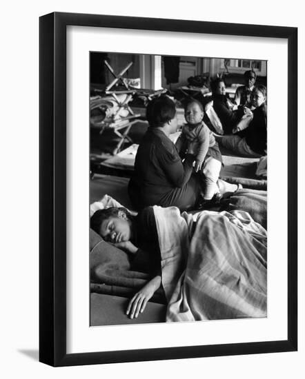African American Refugees Left Homeless After Severe Flooding Sleep in Temporary Relief Station-Margaret Bourke-White-Framed Photographic Print