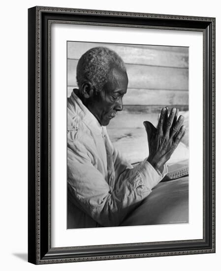 African American Sharecropper Dave Alexander Saying Evening Prayers as He Kneels at Bedside at Home-Alfred Eisenstaedt-Framed Photographic Print