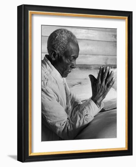 African American Sharecropper Dave Alexander Saying Evening Prayers as He Kneels at Bedside at Home-Alfred Eisenstaedt-Framed Photographic Print