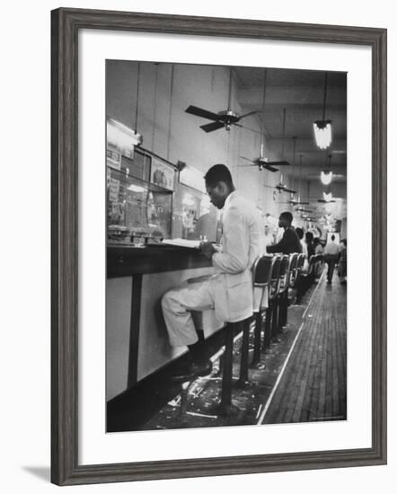 African American Student Virginius B. Thornton During a Sit Down Strike at a Lunch Counter-Howard Sochurek-Framed Photographic Print