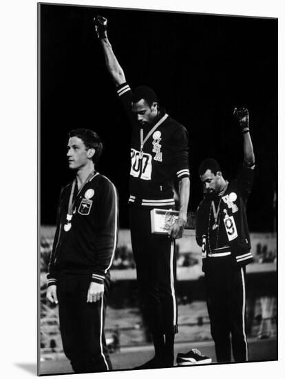 African American Track Star Tommie Smith, John Carlos After Winning Gold and Bronze Olympic Medal-John Dominis-Mounted Premium Photographic Print