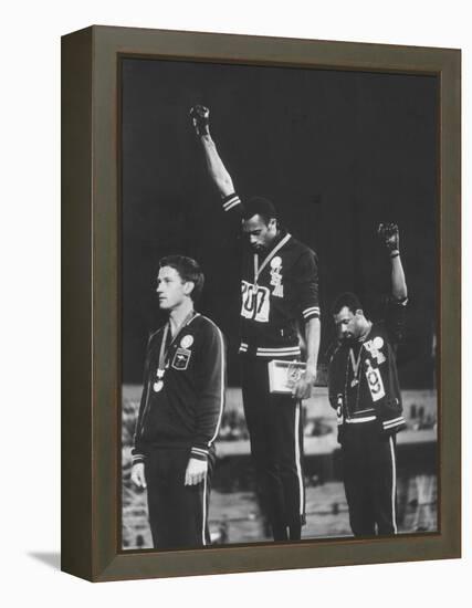 African-American Track Stars Tommie Smith and John Carlos after Winning Olympic Medals-John Dominis-Framed Premier Image Canvas