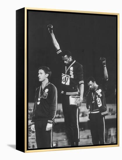 African-American Track Stars Tommie Smith and John Carlos after Winning Olympic Medals-John Dominis-Framed Premier Image Canvas