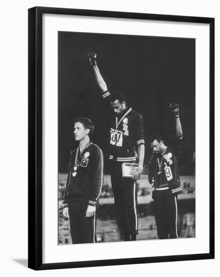 African-American Track Stars Tommie Smith and John Carlos after Winning Olympic Medals-John Dominis-Framed Premium Photographic Print