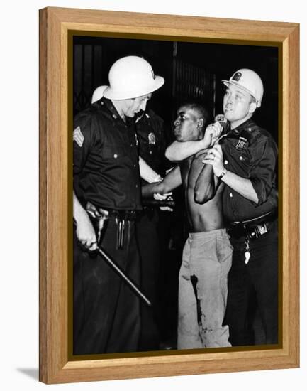 African American Who Has Been Shot in the Leg, Is Restrained by New York City Police-null-Framed Stretched Canvas