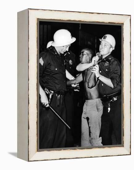 African American Who Has Been Shot in the Leg, Is Restrained by New York City Police-null-Framed Stretched Canvas