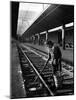 African American Woman Picking Up Debris on Tracks at Union Station-Alfred Eisenstaedt-Mounted Photographic Print