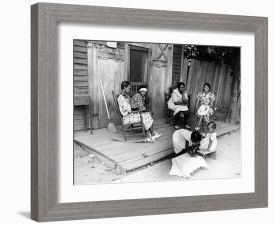 African American Women Sitting on the Porch of their Ramshackle House Watching their Children Play-Alfred Eisenstaedt-Framed Photographic Print