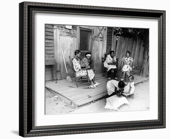 African American Women Sitting on the Porch of their Ramshackle House Watching their Children Play-Alfred Eisenstaedt-Framed Photographic Print