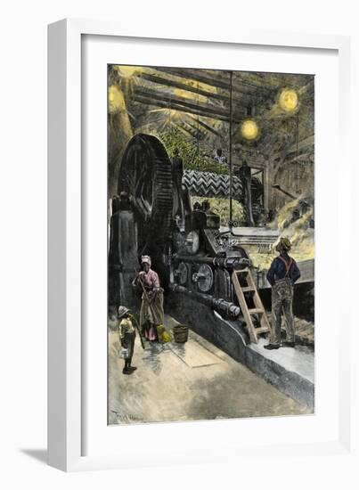 African-American Workers Operating a Cane-Crushing Machine in a Sugar House at Bayou Teche, c.1900-null-Framed Giclee Print