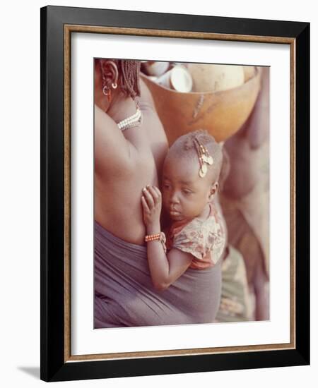 African Child Being Carried by Her Mother-Howard Sochurek-Framed Photographic Print