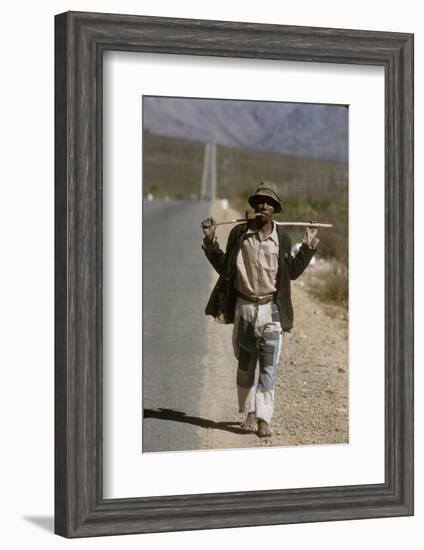 African Man Walks Along Side of Road, Durban, South Africa, 1960-Grey Villet-Framed Photographic Print