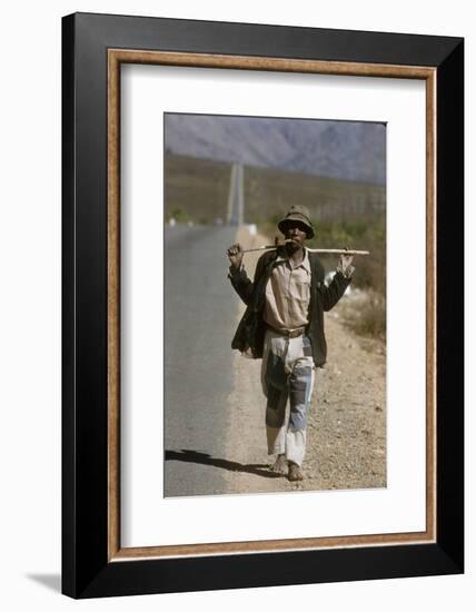 African Man Walks Along Side of Road, Durban, South Africa, 1960-Grey Villet-Framed Photographic Print