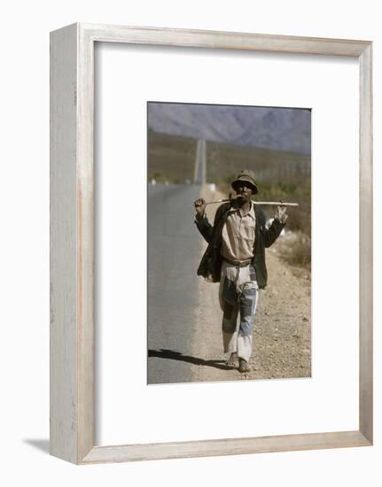 African Man Walks Along Side of Road, Durban, South Africa, 1960-Grey Villet-Framed Photographic Print