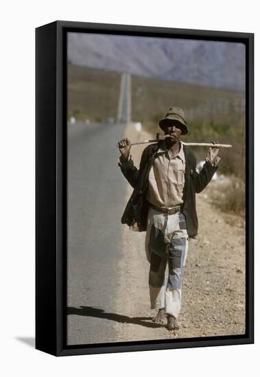 African Man Walks Along Side of Road, Durban, South Africa, 1960-Grey Villet-Framed Premier Image Canvas