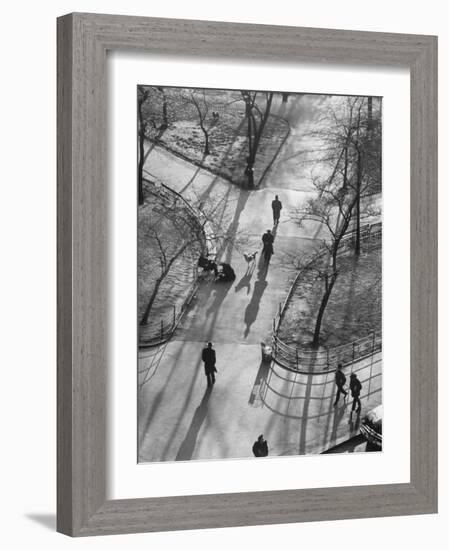 Afternoon Sunlight Casting Long Shadows in Washington Square Park-Yale Joel-Framed Photographic Print