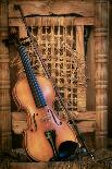 Left Handled Violin Lying on an Old and Ruined Chair-AGCuesta-Photographic Print