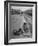 Aged Refugee Fighting Hunger, Sweeps Up Spilled Rice on the Railroad Station Platform-Jack Birns-Framed Photographic Print