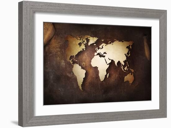 Aged World Map on a Dirty Piece of Fabric-null-Framed Art Print