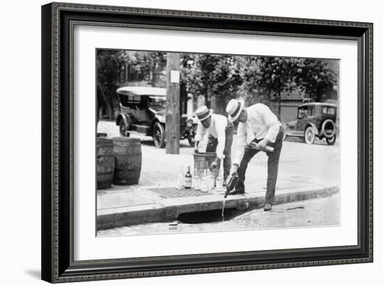 Agents Pouring Liquor Down a Sewer on the Street-null-Framed Art Print