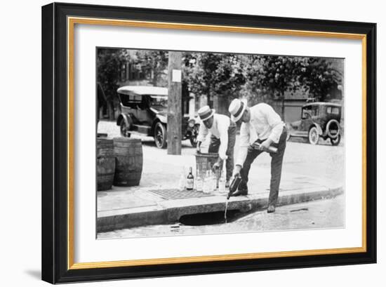 Agents Pouring Liquor Down a Sewer on the Street-null-Framed Art Print