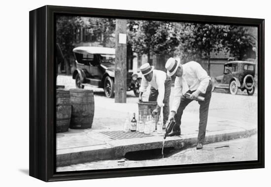 Agents Pouring Liquor Down a Sewer on the Street-null-Framed Stretched Canvas