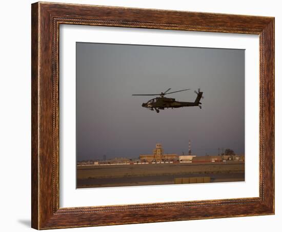 AH-64 Apache Helicopter Flies by the Control Tower on Camp Speicher-Stocktrek Images-Framed Photographic Print