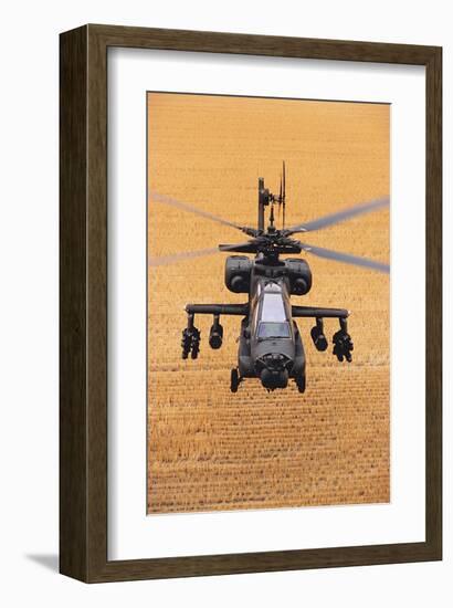 AH-64A Apache flies over fields-null-Framed Art Print