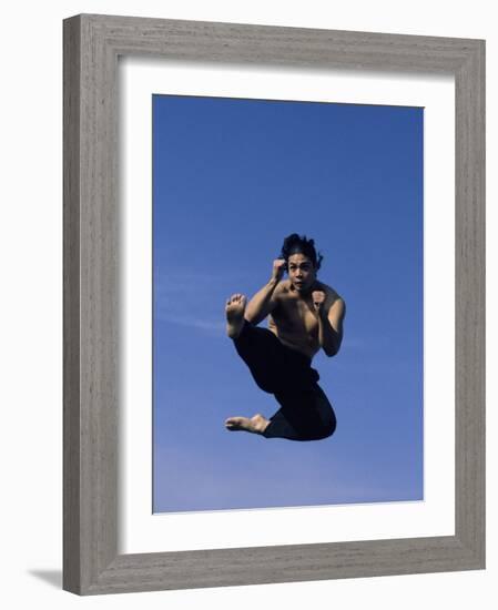 Airborne Martial Artist-null-Framed Photographic Print