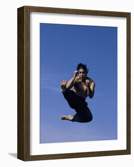 Airborne Martial Artist-null-Framed Photographic Print