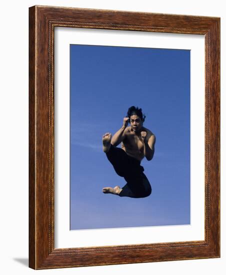 Airborne Martial Artist-null-Framed Photographic Print