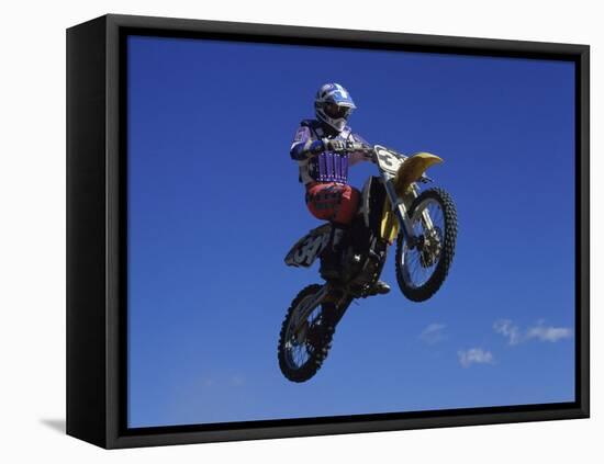 Airborne Motorcyclist-null-Framed Premier Image Canvas