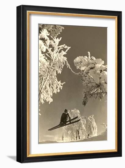 Airborne Skier Amid Frost-Laden Trees-null-Framed Art Print