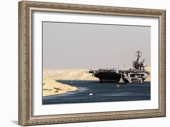 Aircraft Carrier USS Harry S. Truman Passes Underneath the Suez Canal Bridge, 2010-null-Framed Photo