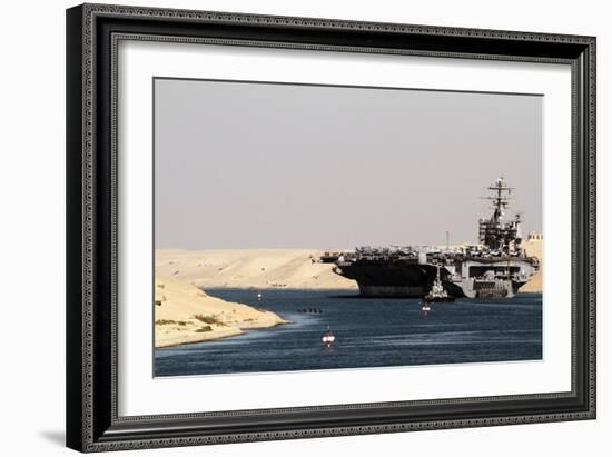 Aircraft Carrier USS Harry S. Truman Passes Underneath the Suez Canal Bridge, 2010-null-Framed Photo