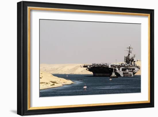 Aircraft Carrier USS Harry S. Truman Passes Underneath the Suez Canal Bridge, 2010-null-Framed Photo