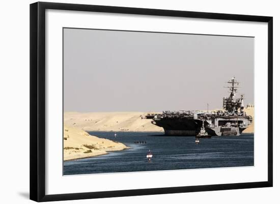 Aircraft Carrier USS Harry S. Truman Passes Underneath the Suez Canal Bridge, 2010-null-Framed Photo