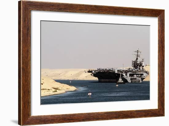 Aircraft Carrier USS Harry S. Truman Passes Underneath the Suez Canal Bridge, 2010-null-Framed Photo