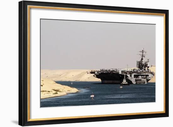 Aircraft Carrier USS Harry S. Truman Passes Underneath the Suez Canal Bridge, 2010-null-Framed Photo