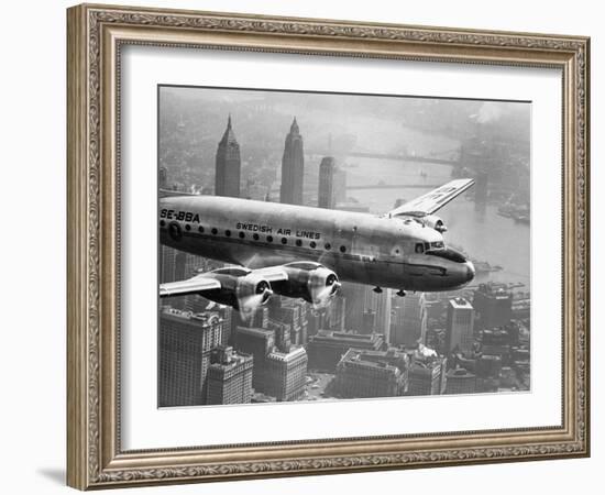 Aircraft Flying over City, 1946-null-Framed Art Print