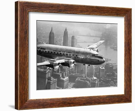 Aircraft Flying over City, 1946-null-Framed Art Print