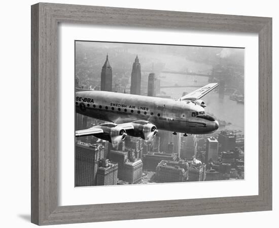 Aircraft Flying over City, 1946-null-Framed Art Print