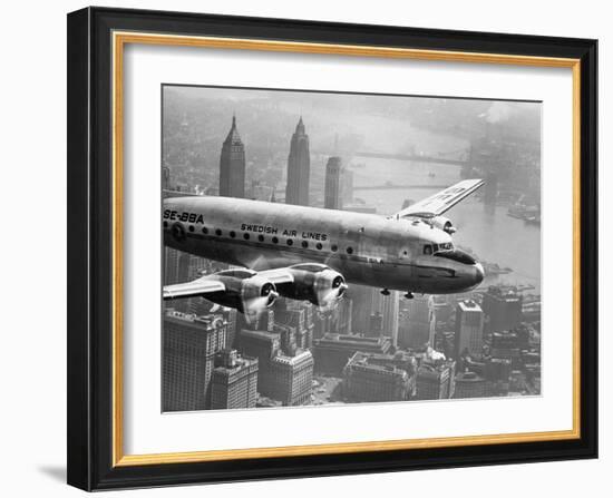 Aircraft Flying over City, 1946-null-Framed Art Print