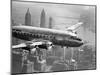 Aircraft Flying over City, 1946-null-Mounted Art Print