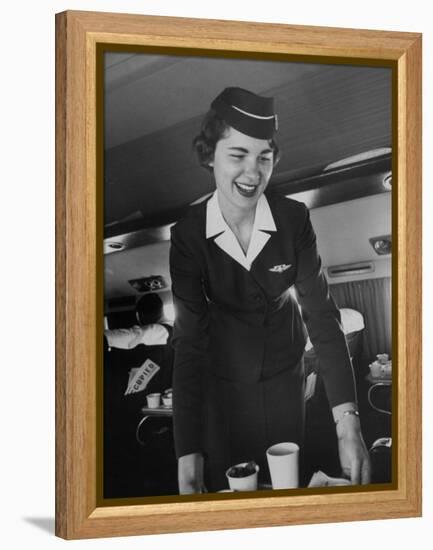Airline Stewardess Seving Coffee-Peter Stackpole-Framed Premier Image Canvas