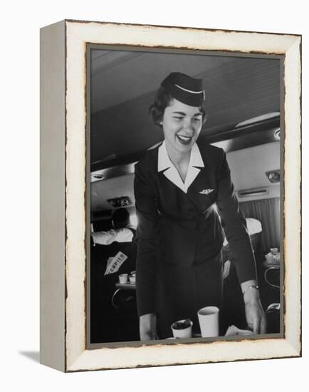 Airline Stewardess Seving Coffee-Peter Stackpole-Framed Premier Image Canvas