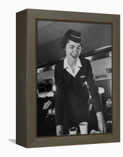 Airline Stewardess Seving Coffee-Peter Stackpole-Framed Premier Image Canvas