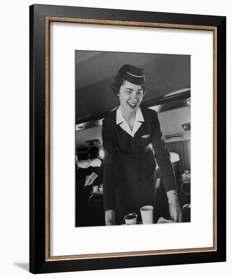 Airline Stewardess Seving Coffee-Peter Stackpole-Framed Photographic Print